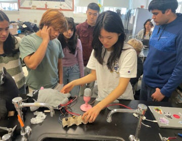 Some Princeton High School students working on of the prototypes they are developing for their entry in Samsung Electronics