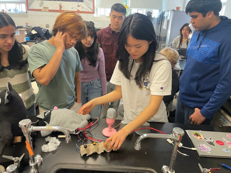 Some Princeton High School students working on of the prototypes they are developing for their entry in Samsung Electronics' Solve for Tomorrow competition