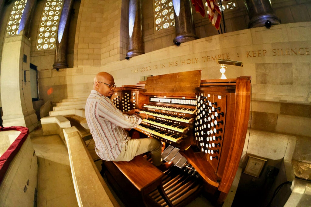 Paul Eaton, chair of fine arts at Girard College, plays the organ in the college chapel