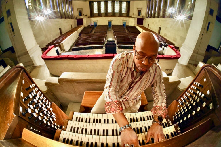 Paul Eaton, chair of fine arts at Girard College, plays the organ in the college chapel.