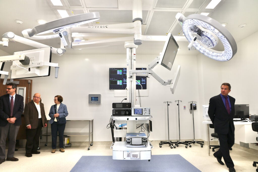People touring the operating room at the new facility