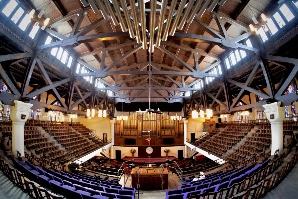 The pipes of the Tindley Temple organ are positioned in the front, back and corners of the sanctuary in order to surround the listener.