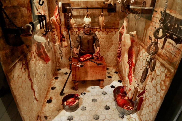 Jamie Wyeth's ''Butcher Shop'' tableau is part of ''Unsettled,'' an exhibit looking at the artist's darker work at the Brandywine Museum of Art. (Emma Lee/WHYY)