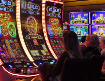 Gamblers play slot machines at the Ocean Casino Resort in Atlantic City, N.J. on Nov. 29, 2023. Figures released on Tuesday, Feb. 20, 2024, by the American Gaming Association show that the U.S. commercial casino industry had its best year ever in 2023, winning $66.5 billion from gamblers. When figures from tribal casinos are tallied later this year, the combined total is expected to approach $110 billion for 2023. (AP Photo/Wayne Parry)