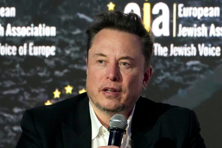 Tesla and SpaceX CEO Elon Musk addresses the European Jewish Association's conference, Jan. 22, 2024, in Krakow, Poland. Former senior executives of Twitter filed suit against Musk and X Corp. on Monday, March 4, saying they are entitled to more than $128 million total in unpaid severance payments.