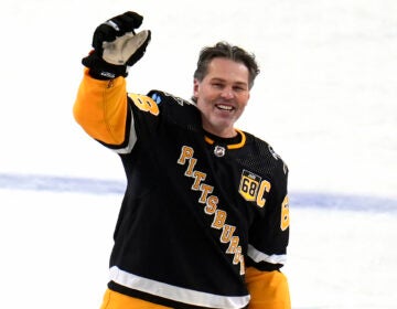 File photo: Former Pittsburgh Penguins player Jaromir Jagr stands at center ice and waves to fans after skating during warm ups after having a banner with his retired uniform number raised to the rafters of PPG Paints arena before an NHL hockey game between the Los Angeles Kings and the Penguins in Pittsburgh, Sunday, Feb. 18, 2024.