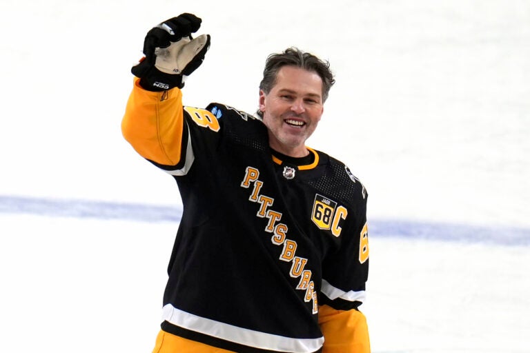 File photo: Former Pittsburgh Penguins player Jaromir Jagr stands at center ice and waves to fans after skating during warm ups after having a banner with his retired uniform number raised to the rafters of PPG Paints arena before an NHL hockey game between the Los Angeles Kings and the Penguins in Pittsburgh, Sunday, Feb. 18, 2024.