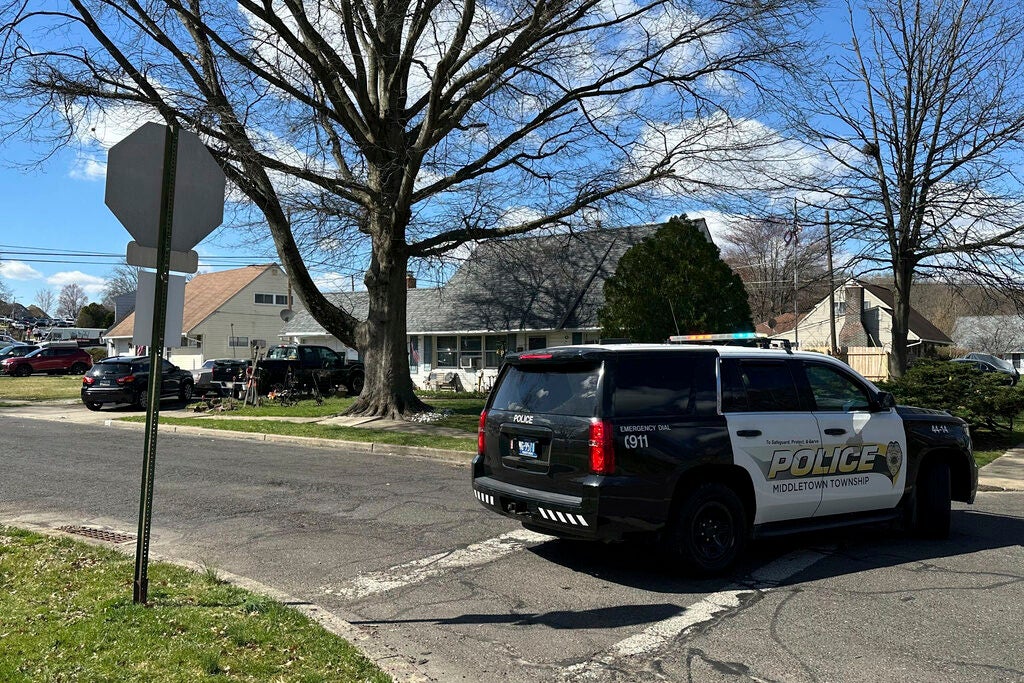 A police car blocks off a street in Levittown