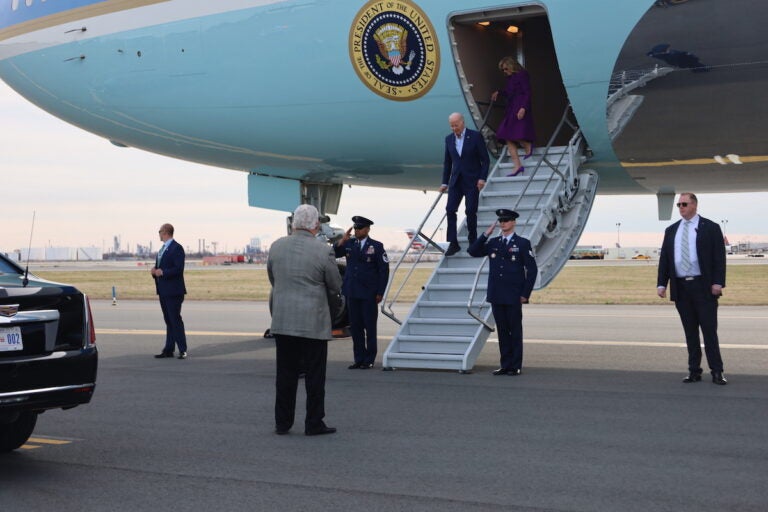 President Biden walks down the steps of Air Force One