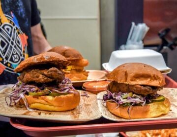 Algorithm Vegan Grill's Nashville Hot sandwich uses brined Blackbird Seitan, dredged in seasoned flour and lightly fried, with homemade bread and butter pickles in a sweet potato bun.