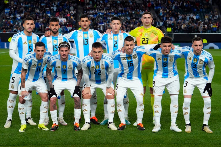 Argentina players pose for a photograph before a friendly soccer match