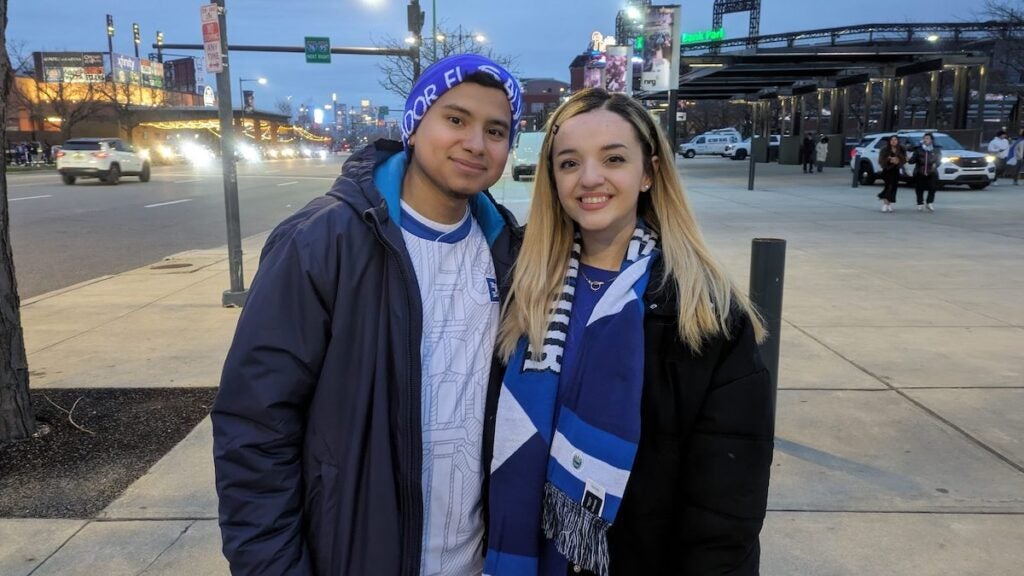 Christian Navas, left, and Sofía Vega, right, pose for a photo outside of Lincoln Financial Stadium
