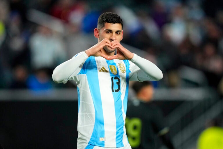 Argentina's Cristian Romero reacts after scoring a goal during the first half of a friendly soccer match