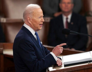 President Biden speaks at a podium