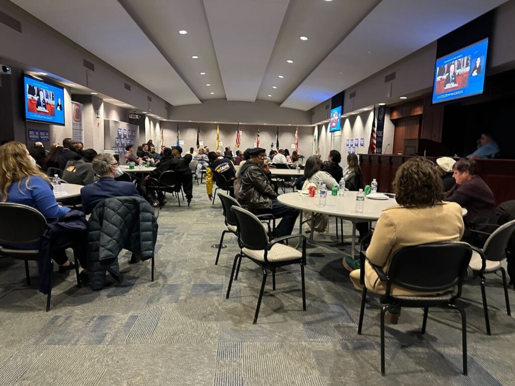 Local Democrats, union members and others watch from the Eastern Atlantic States Regional Council of Carpenters headquarters in Philadelphia as President Joe Biden delivers his State of the Union address. on March 7, 2024. 