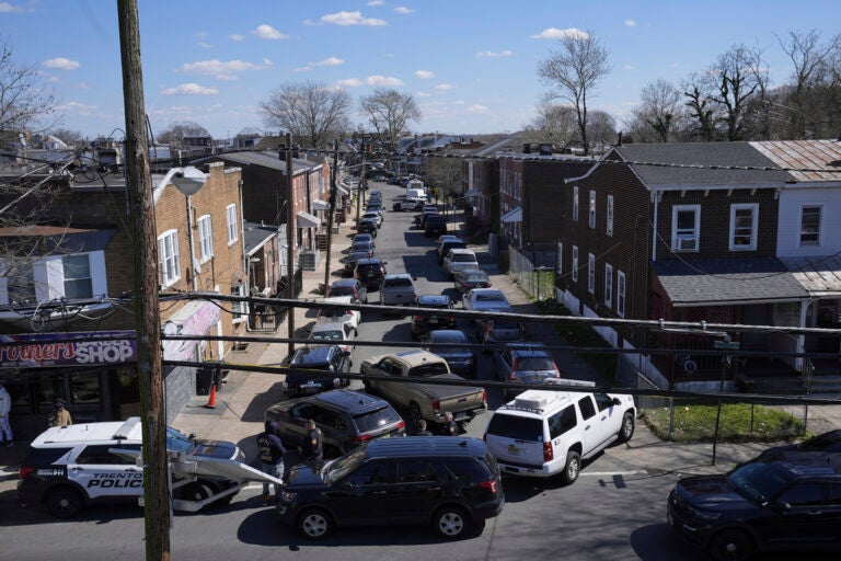 An aerial view of cars blocking off a street in Trenton, New Jersey where a suspected shooter barricaded himself