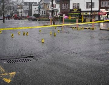 Evidence markers are seen following a shooting in Northeast Philadelphia