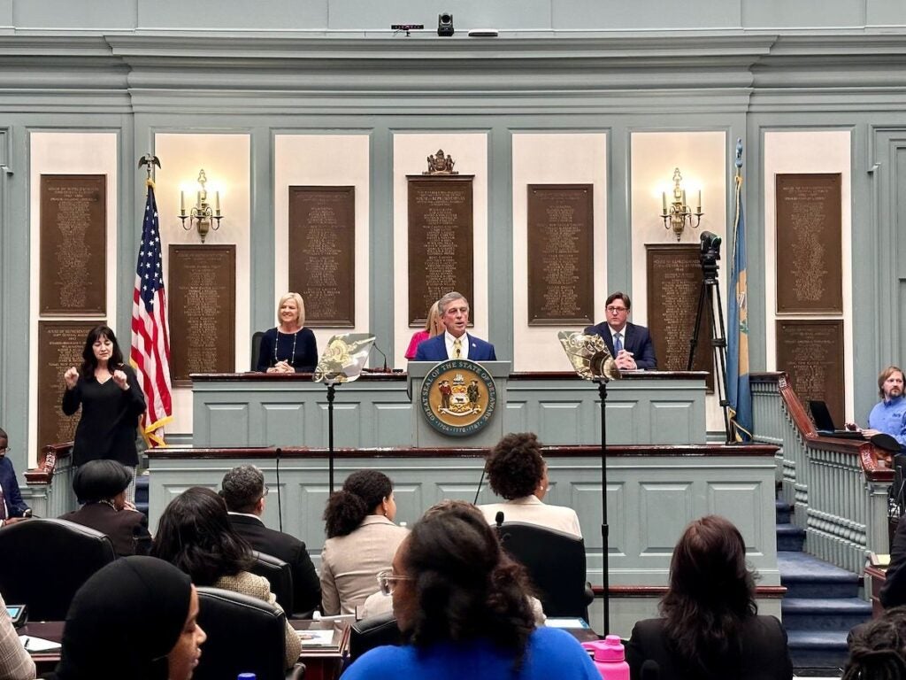 Del. Gov. John Carney speaks from the podium.