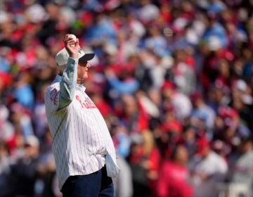 Former Philadelphia Phillies manager Charlie Manuel throws out a ceremonial first pitch ahead of an opening day baseball game between the Philadelphia Phillies and the Atlanta Braves, Friday, March 29, 2024, in Philadelphia.