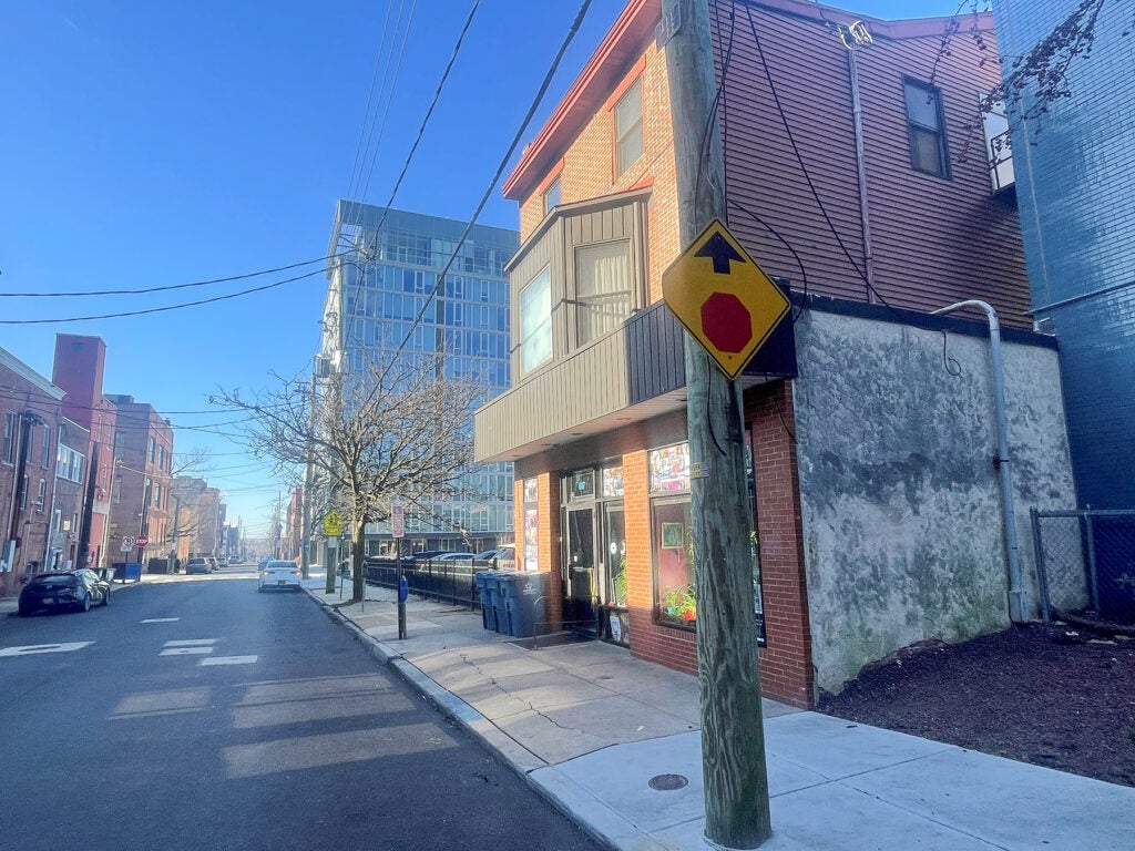 The Creative VIsion Factory building, with new apartment buildings seen next door