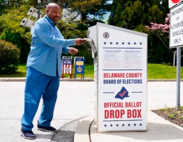 David Harrison drops off his mail ballot for the Pennsylvania primary election in Newtown Square, Pa., Monday, May 2, 2022.