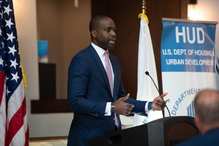 Eugene Young speaking at a podium