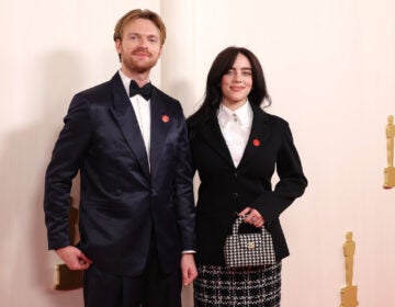 Billie Eilish and Finneas O'Connell wear pins in support of a cease-fire in Gaza while they attend the 96th Annual Academy Awards on Sunday Hollywood, Calif.