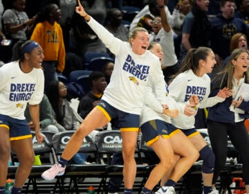 Members of the Drexel team celebrate during the second half of an NCAA college basketball game against Stony Brook in the championship of the Colonial Athletic Association conference women's tournament, Sunday, March 17, 2024, in Washington.