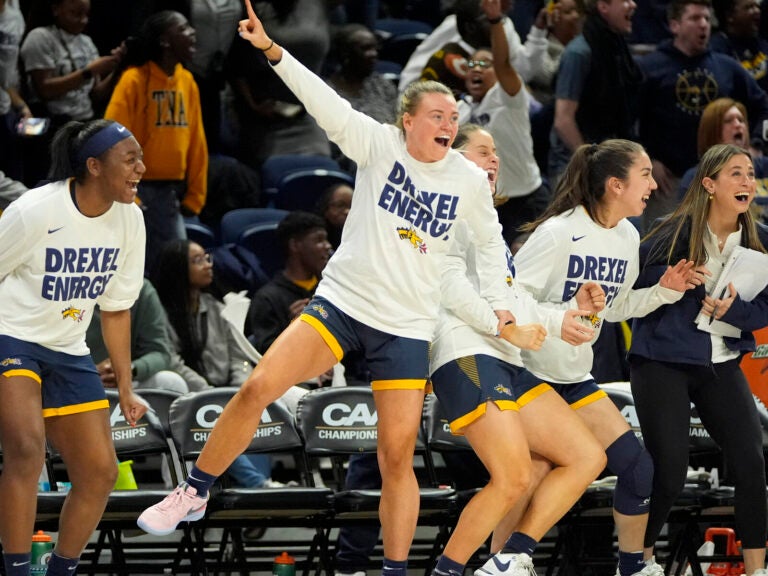 Members of the Drexel team celebrate during the second half of an NCAA college basketball game against Stony Brook in the championship of the Colonial Athletic Association conference women's tournament, Sunday, March 17, 2024, in Washington.