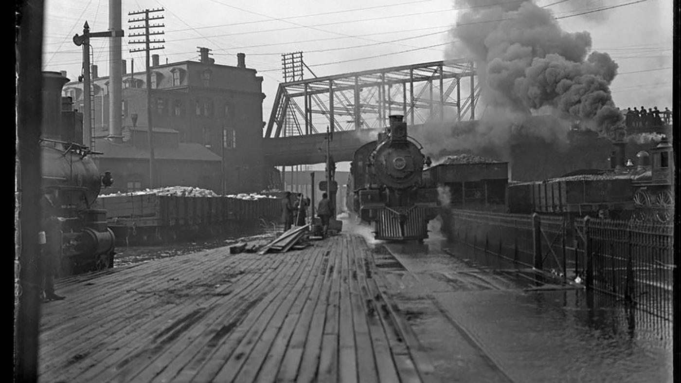 Vintage photo of a train entering a station