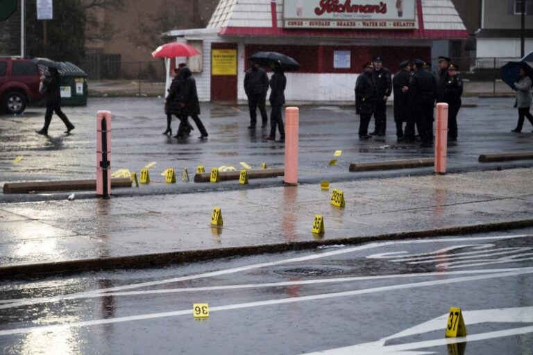 Evidence markers are seen following a shooting in Northeast Philadelphia on Wednesday, March 6, 2024.