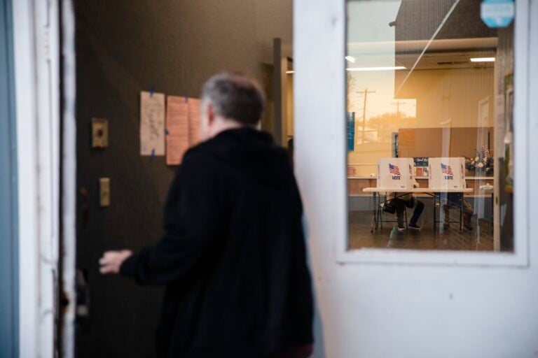 Voter entering a polling place