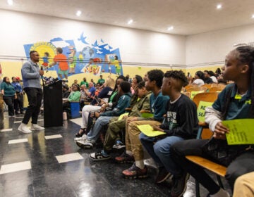 Eagles QB Jalen Hurts speaking to students at Edward Gideon Elementary School