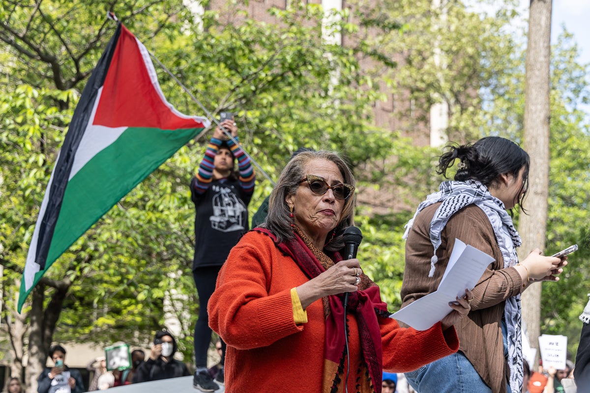 Eve Troutt Powelle, a professor of history and Africana studies at the University of Pennsylvania, likens the war in Gaza to apartheid in South Africa at a protest of U.S. support of Israel in the Gaza war on the school’s campus on April 25, 2024. (Kimberly Paynter/WHYY)