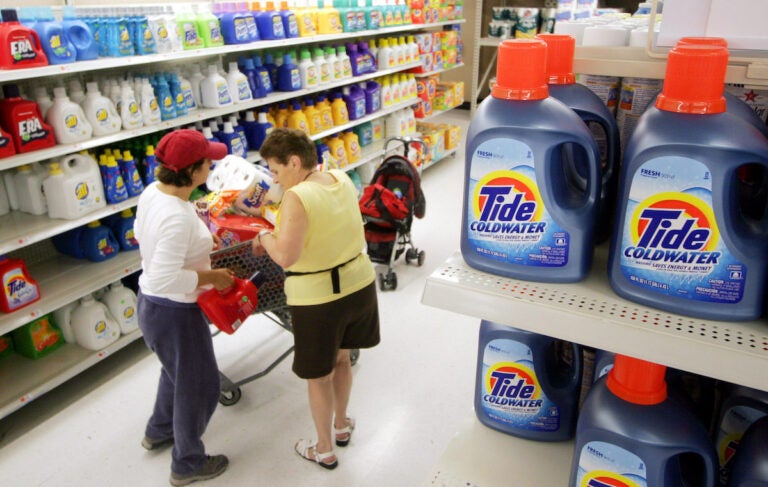 Shoppers pass a display of Procter & Gamble's Tide detergent at a Wal-Mart in White Plains, N.Y. July 21, 2006. (AP Photo/Mark Lennihan)