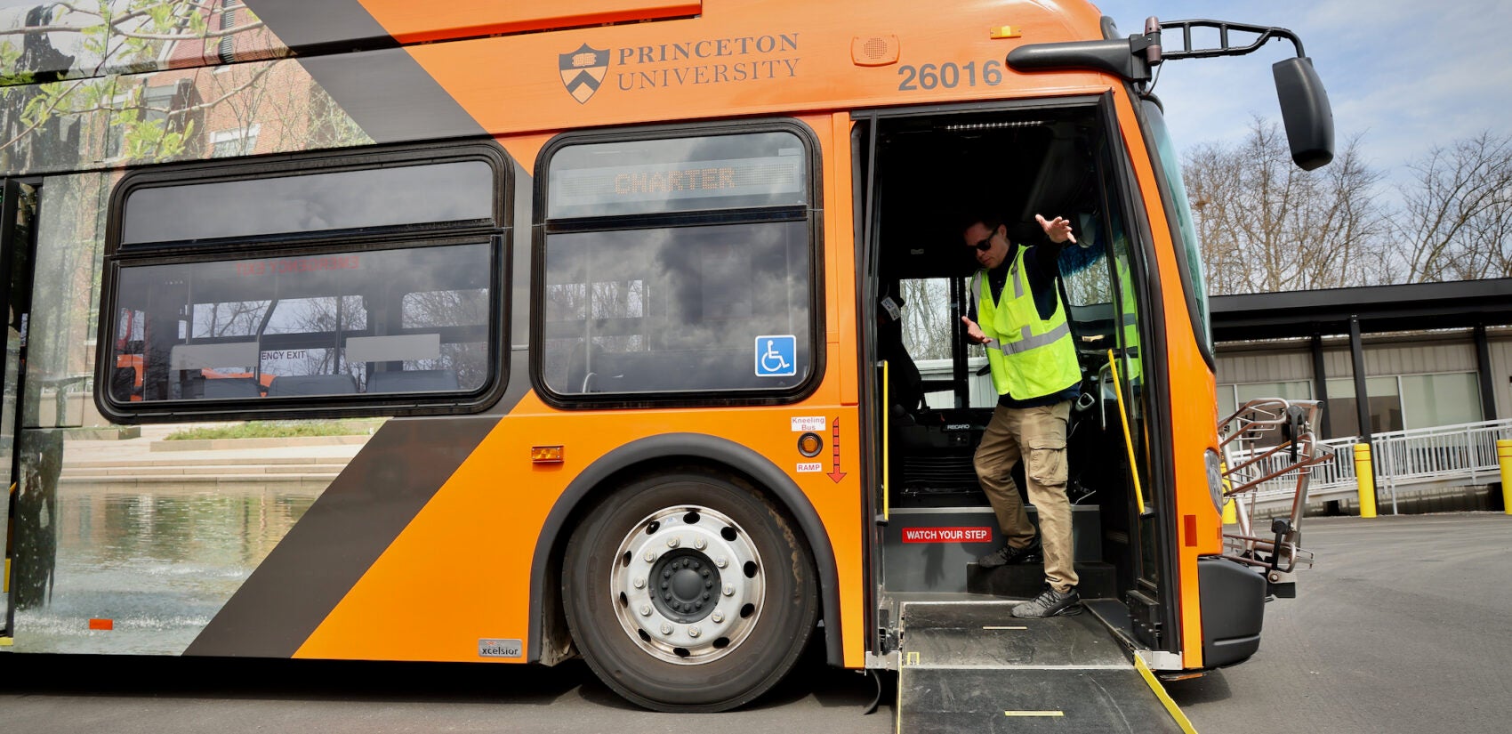 Steve Stewart, senior operations manager for WeDriveU, shows off a ramp on one of the buses