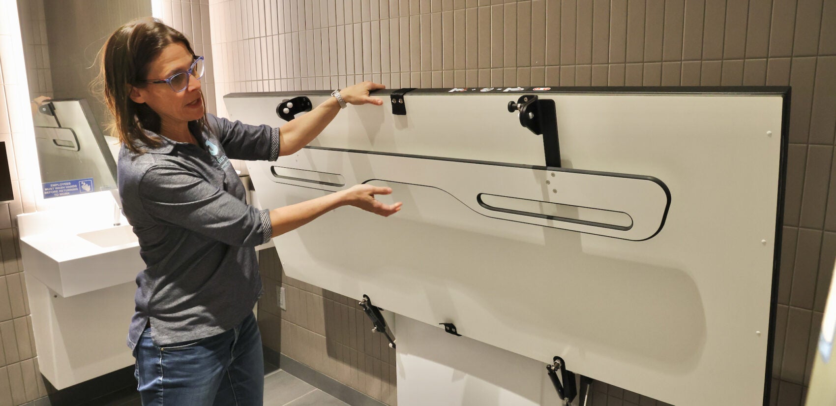 Dr. Wendy Ross operates an adult changing table