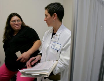 A family nurse practitioner talks with a pregnant patient at the Clinica de Salud del Valle de Salinas, a community clinic, in Salinas, Calif. (AP File Photo)