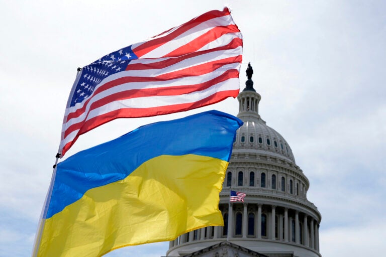 The American and Ukrainian flags wave in the wind outside of the Capitol on Tuesday, April 23, 2024, in Washington. The Senate is moving ahead with $95 billion in war aid to Ukraine, Israel and Taiwan.