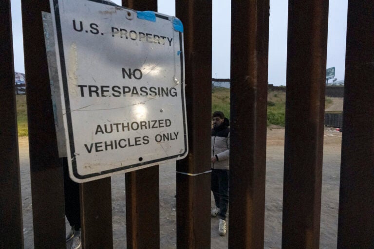 Sign on a border wall