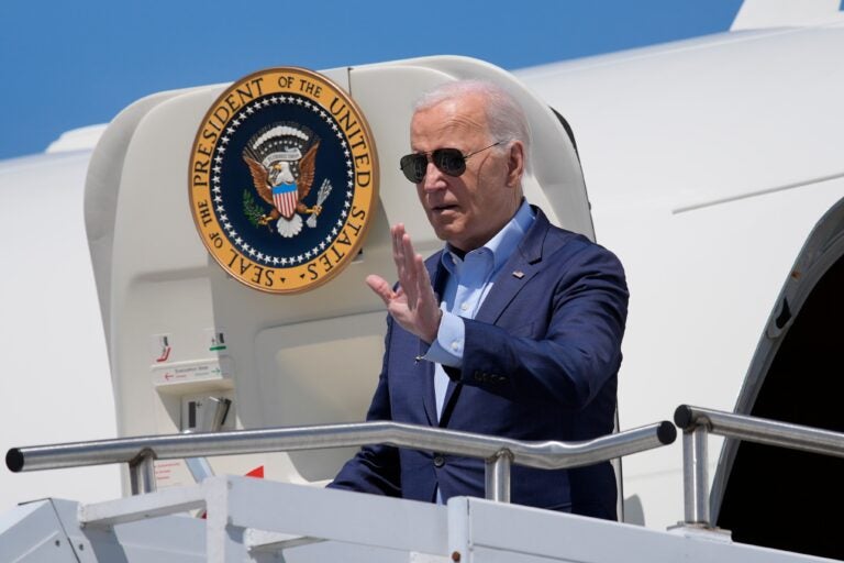 President Joe Biden waves at Wilkes-Barre Scranton International Airport