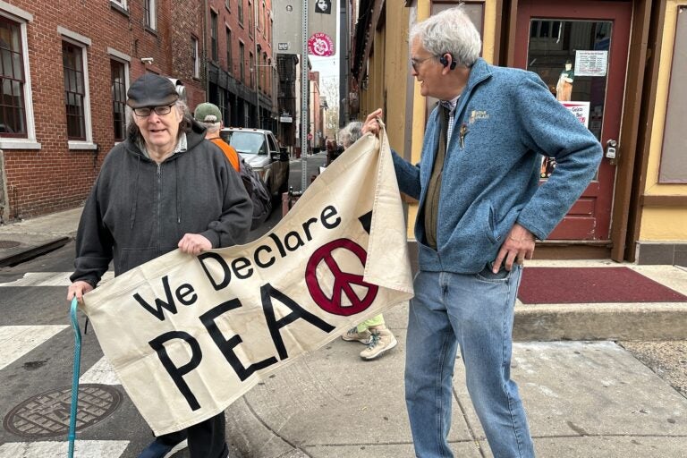 Peace activists protest outside the U.S. Custom House in Old City