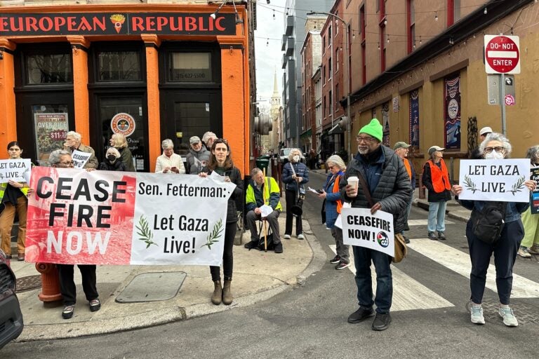 Peace activists protest outside the U.S. Custom House in Old City