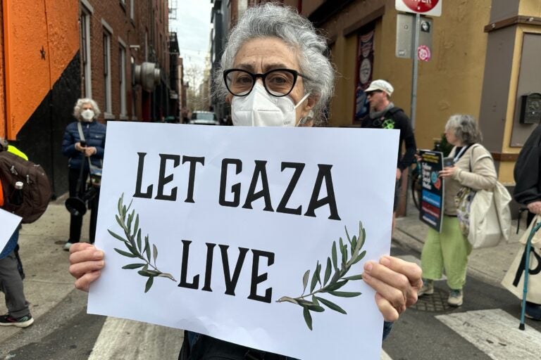 Peace activists protest outside the U.S. Custom House in Old City.