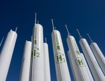 tall green hydrogen tanks
