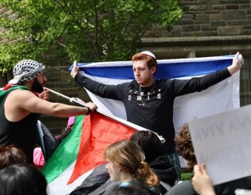Qais Dana, a Community College of Philadelphia student from Palestine, and a Jewish student, who identified himself only as Danny, clash during a protest