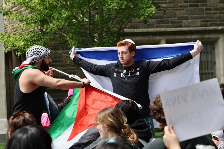 Qais Dana, a Community College of Philadelphia student from Palestine, and a Jewish student, who identified himself only as Danny, clash during a protest