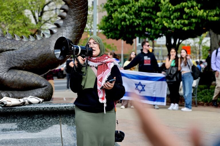 A protester speaks at Drexel