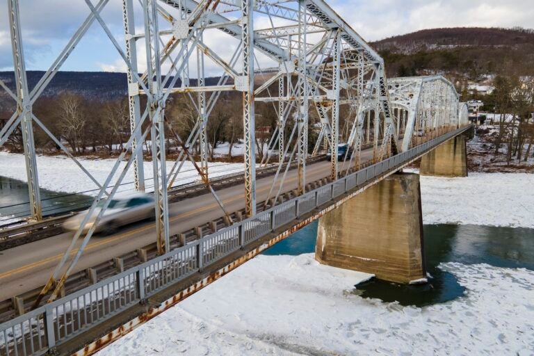 People drive on the Nanticoke/West Nanticoke Bridge in West Nanticoke, Pennsylvania