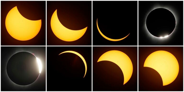 This combination of photos shows the path of the sun during a total eclipse by the moon Monday, Aug. 21, 2017, near Redmond, Ore.
